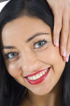 portrait of the brunette with blue eye on insulated background
