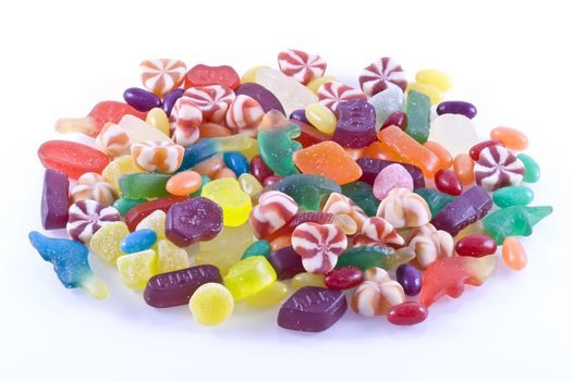 Different kinds of candy on a white background.