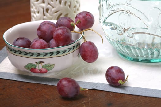 Still life with Grape and Ceramic Dishes