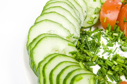 Fresh vegetable salad - tomatoes and cucumber with green onion