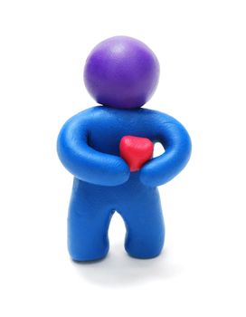 3d  Man of Blue Plasticine Holding Red Heart Isolated on White Background