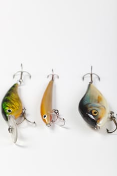 Fishing lures on white backbround