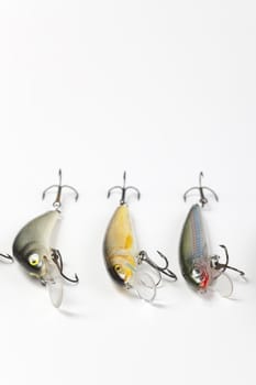 Fishing lures on white backbround