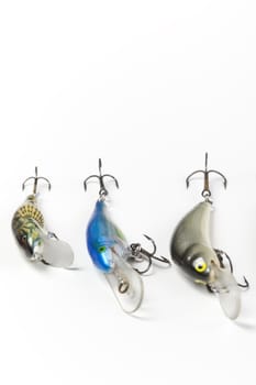 Fishing lures on white backbround