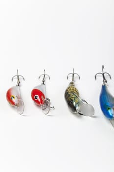 Fishing lures on white backbround