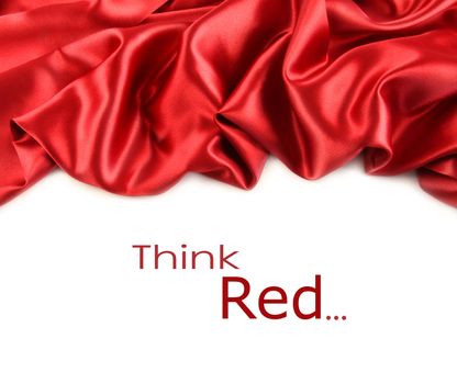 Red satin fabric against white background