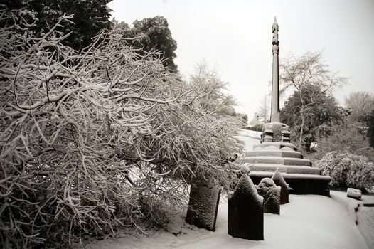 Cardiff cathedral cemetry covered by snow, horizontally framed shot