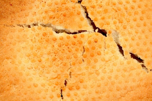 The cracked crust of bread, background