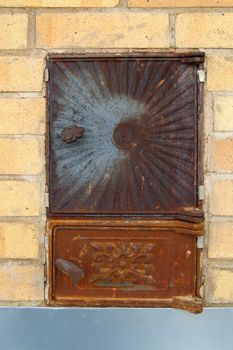 two the cast-iron stove doors and stove bricking    