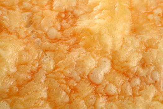 fresh bread with a cheese crust, background