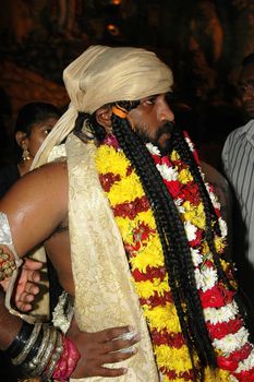 Male devotee at Thaipusam event celebrating Lord Murugan