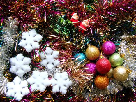 Christmas decorations and snowflakes on the garland    