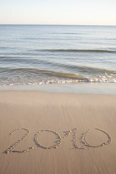 Text written on beach