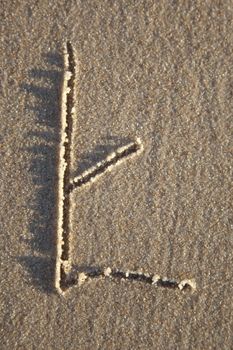 Letter on wet sand