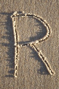 Letter on wet sand