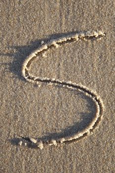 Letter on wet sand