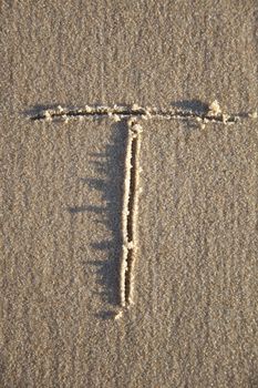 Letter on wet sand