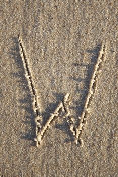 Letter on wet sand