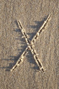 Letter on wet sand