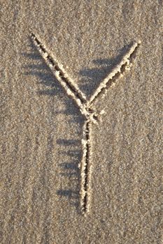 Letter on wet sand