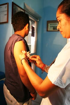Nurse giving injection