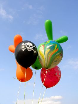 colored balloons against the sky background  