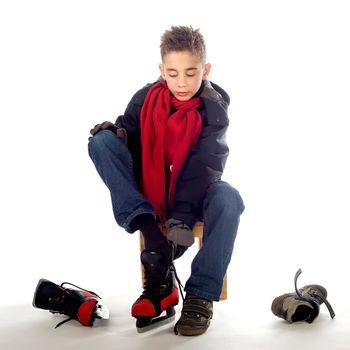 a young boy going ice-skating