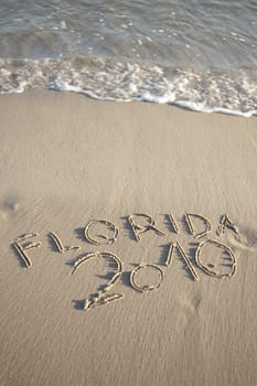 Text written in the beach