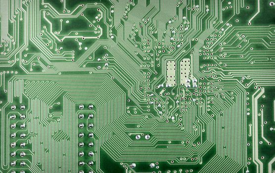 Highly technological background from a green computer plate