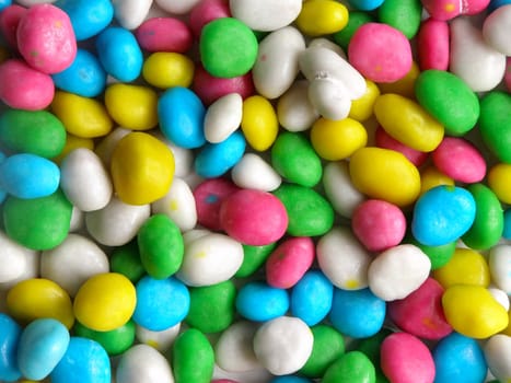 background from varicolored candies, which looks like pebbles