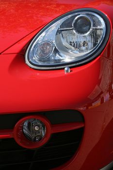 Headlight and cowl of the smart car of red color, (look similar images in my portfolio)