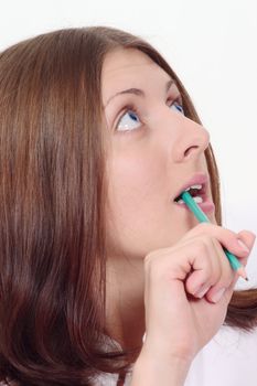 Portrait of the reflecting girl with a pencil removed close up