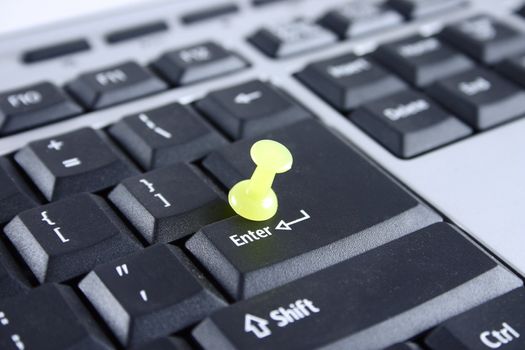 The computer keyboard with the fixed key Enter