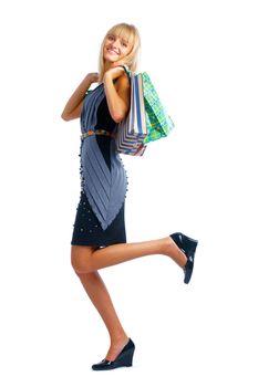 The fair-haired  smiling woman standing on white background whith parcels