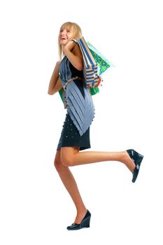 The fair-haired  smiling woman standing on white background whith parcels