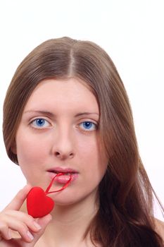 Portrait of the nice girl with toy plush heart