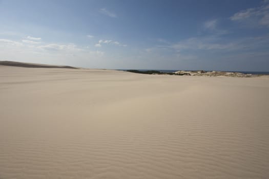 waves of sand - formed by wind and water