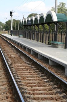 Railway station, rails, cross ties and a traffic light, (look similar images in my portfolio)