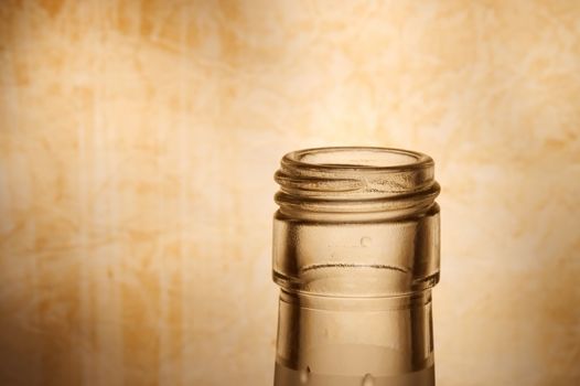 Glass bottle with old paper background