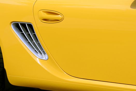The new yellow car, side view 3