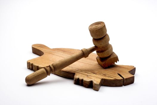  Wooden meat hammer and board on white background