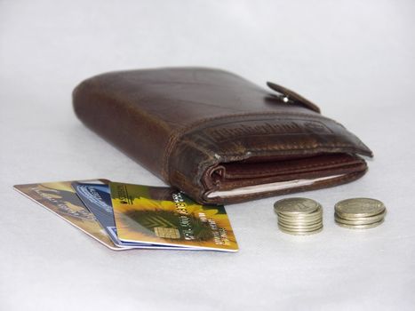 Credit cards and wallet on a white background