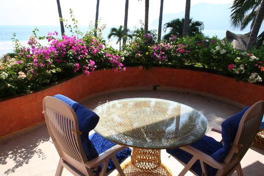 Beautiful balcony with flowers looking at ocean