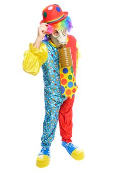 a man in a clown costume wearing a gasmask on a white background