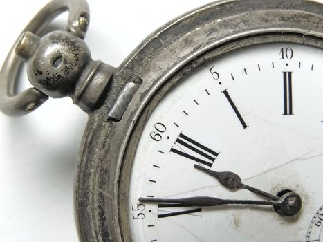 vintage silver clock show five minute till twelve