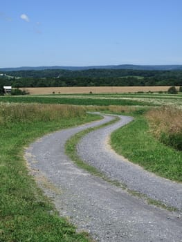 A back road winds through a rural area
