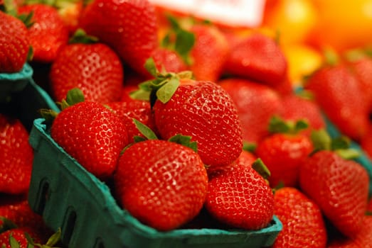 strawberry basket at the market, red fruits