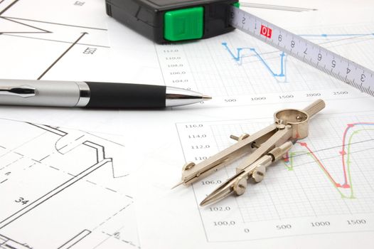 architecture or business still life with plans as background