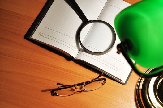 table lamp and drawing tools on office table 

