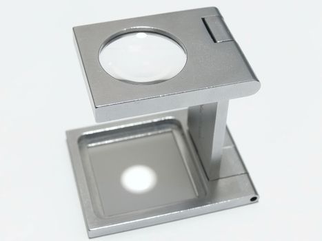 collapsible enlarging lens